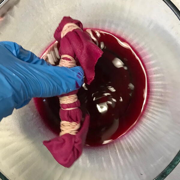 Allow excess liquid to drip back into the dye bowl. Allow excess liquid to drip back into the dye bowl.